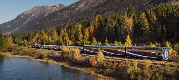 Train by lake.