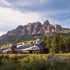 Rocky Mountaineer train passing in front of Castle Mountain