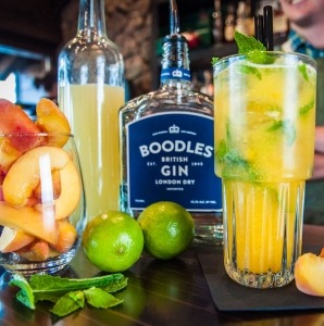 Close up of cocktails and bartender at Distillery Park Restaurant and Bar in Banff townsite